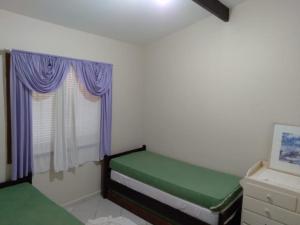 Casa Praia. Linda varanda para um cochilo na rede