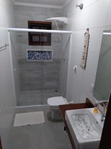 Casa Praia. Linda varanda para um cochilo na rede