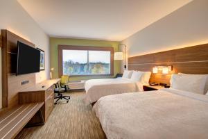 Queen Room with Two Queen Beds with Lakeview room in Holiday Inn Express & Suites - Charlotte Southwest an IHG Hotel