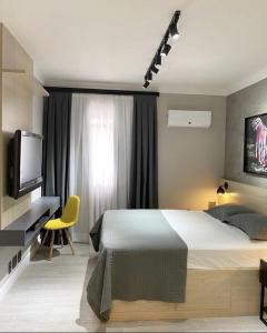 Studio moderno - Jardins: Cama Queen, Ar e Garagem