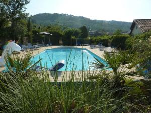 Cottage around a swimming pool in a small villa