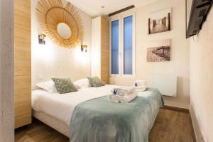 Appartements HSH Moinon - Canal St-Martin Magnifique Appartement 2BR : photos des chambres