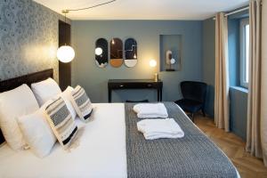 Appartements Ma Suite - Maison Tillot : photos des chambres