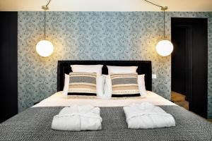 Appartements Ma Suite - Maison Tillot : photos des chambres