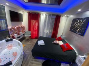 Appartements Le Reve d'une Nuit suite Amour : photos des chambres