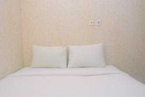 Cozy Living with Modern Design 1BR Kebagusan City Apartment By Travelio