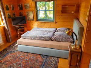 Malerisches Holzhaus "Coco" mit Kamin, Sauna und eigenem Garten