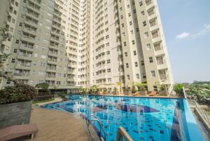 Fabulous Thematic 2BR Apartment at Parahyangan Residence near UNPAR By Travelio