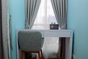 Relaxing Studio at Tifolia Apartment By Travelio