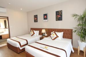 Phòng Hai Giường Đơn Loại Sang (Deluxe Twin Room)