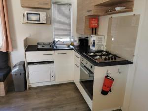 Campings Assist' Mobil Home 454 - Beau Mobil home 6 personnes 2 chambres : Mobile Home