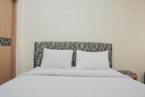 Homey 2BR Apartment @ Belmont Residence By Travelio