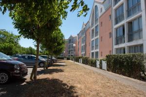 Appartements Ma Location Sablaise - Appart' Les Pins : photos des chambres