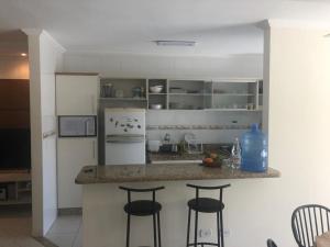 Apartamento área nobre da praia grande, vista para o mar, 3 suítes