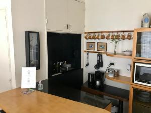 Estilo y Comodidad en Av Corrientes, departamento con cochera para autos