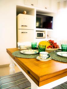 Cala Verdegiglio Home