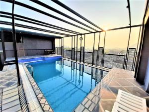Suvin Residency with Rooftop Swimming Pool