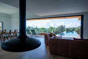 Villas Villa de luxe surplombant la mer, piscine suspendue : photos des chambres