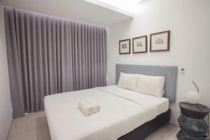 Premium 2BR Apartment near Marvell City Mall at The Linden By Travelio