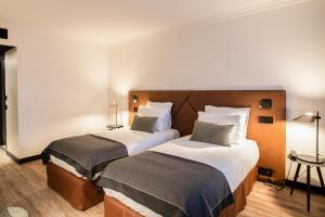 Appart'hotels Appart'City Collection Geneve Aeroport - Ferney Voltaire : photos des chambres