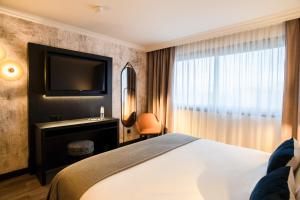 Appart'hotels Appart'City Collection Geneve Aeroport - Ferney Voltaire : photos des chambres