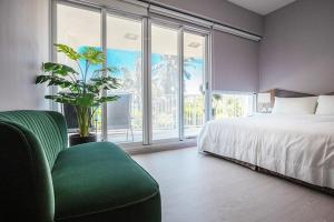 Phòng 4 Người Nhìn Ra Biển (Quadruple Room with Sea View)