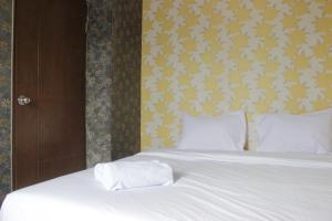 Minimalist 2BR Apartment at Gateway Ahmad Yani Cicadas By Travelio