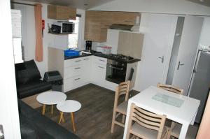 Campings mobil home 32 m² 4/6p : photos des chambres