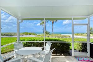 LaPlaya 105B-Relax on the balcony and watch the dolphins swim by and the pelicans dive!