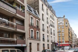 Appartements Charming industrial-style studio just nearby Montmartre in Paris - Welkeys : photos des chambres