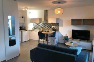 Appartements L'ECHAPPEE BELLE - Charme, Parking & Proche Lac : photos des chambres