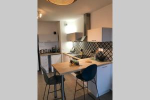 Appartements L'ECHAPPEE BELLE - Charme, Parking & Proche Lac : photos des chambres