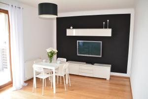 Apartament Black & White Wczasowa - 3hvězdičkové hotely ve městě Ustka