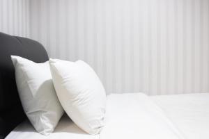 Pleasant and Homey 2BR Apartment at Tamansari La Grande By Travelio