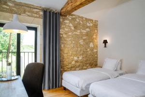 Hotels Le Domaine de Baulieu : photos des chambres