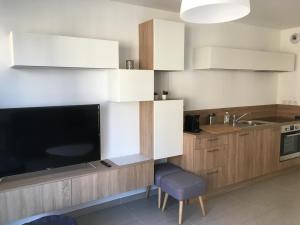 Appartements Georges Beach Appart : photos des chambres