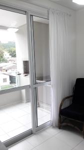 Florianópolis Canasvieiras Apartamento inteiro 3 quartos com ar piscina playground 2 garagens