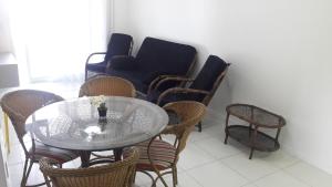 Florianópolis Canasvieiras Apartamento inteiro 3 quartos com ar piscina playground 2 garagens