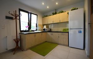 Komfortowe domki nad jeziorem - Zielony domek 1