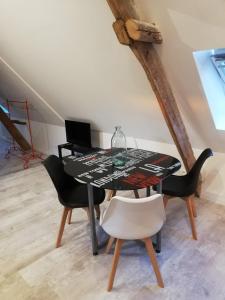 Appartements Au cochon qui rit : photos des chambres