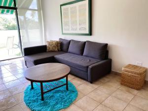 Three-Bedroom Apartment room in Serenity Beach House at Beach Village Tortuga Properties