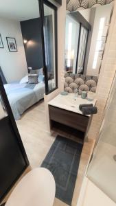 Appartements Home&Work 201 - HYPERCENTRE - fibre et parking a proximite : photos des chambres