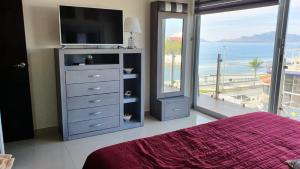 Departamento en malecon Portico Beach