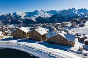 Appartements ODYSSEE B203 Vaste appartement en vieux bois sur les pistes, vue panoramique : photos des chambres