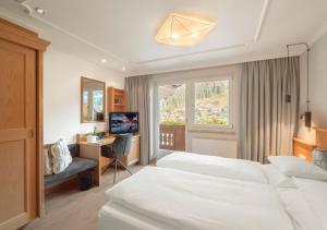 Family Suite room in Das Edelweiss - Salzburg Mountain Resort