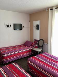 Hotels Le Catinat Fleuri : photos des chambres