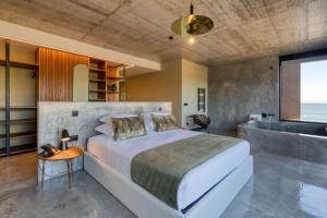 Deluxe Sea Suite room in Well Hotel & Spa