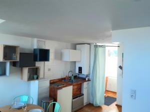 Appartements LUC and SEA : photos des chambres