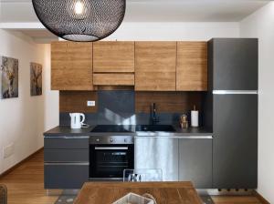 Home AG - AffittiPontediLegno