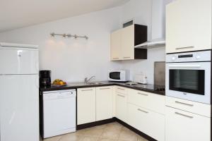 Appartements T3 Plein centre de St Florent : photos des chambres